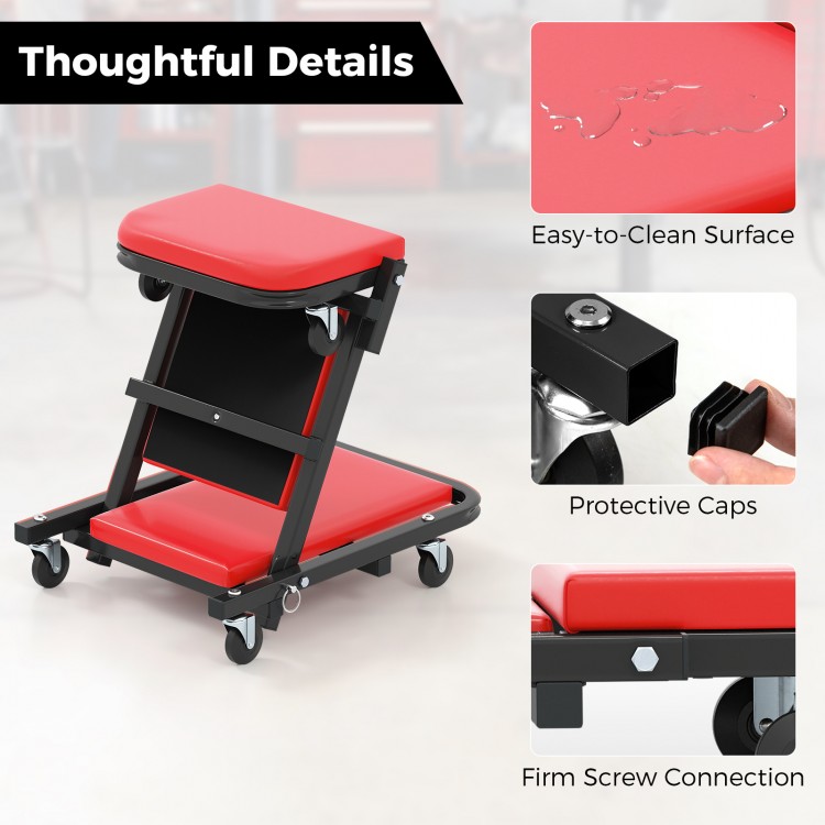 Detail view of the padded seat on the red 2-in-1 folding mechanic creeper, featuring an easy-to-clean PVC leather.
