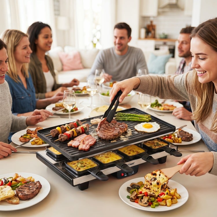 The 2-in-1 table grill and griddle features a reversible nonstick plate, perfect for group meals and family gatherings.