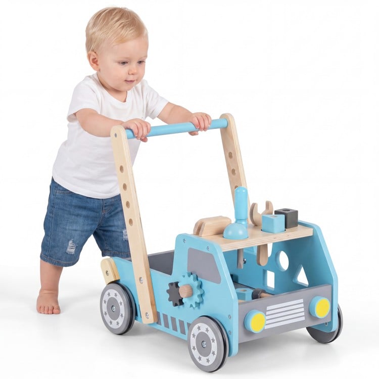 Wooden baby walker in blue with adjustable speed, tool bench features, and bottom storage for organized play.
