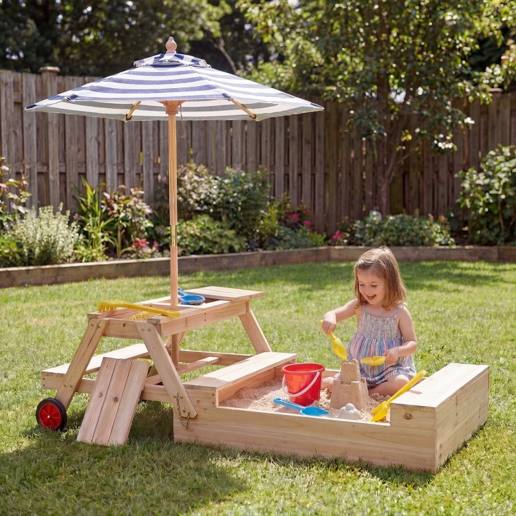 Wooden 2-in-1 sandbox with foldable umbrella and picnic table, perfect for outdoor play and shade for kids aged 3-5.