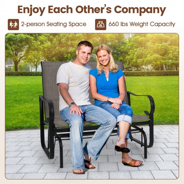 2-person outdoor glider bench with high backrest, brown fabric, ergonomic design, perfect for patio relaxation.