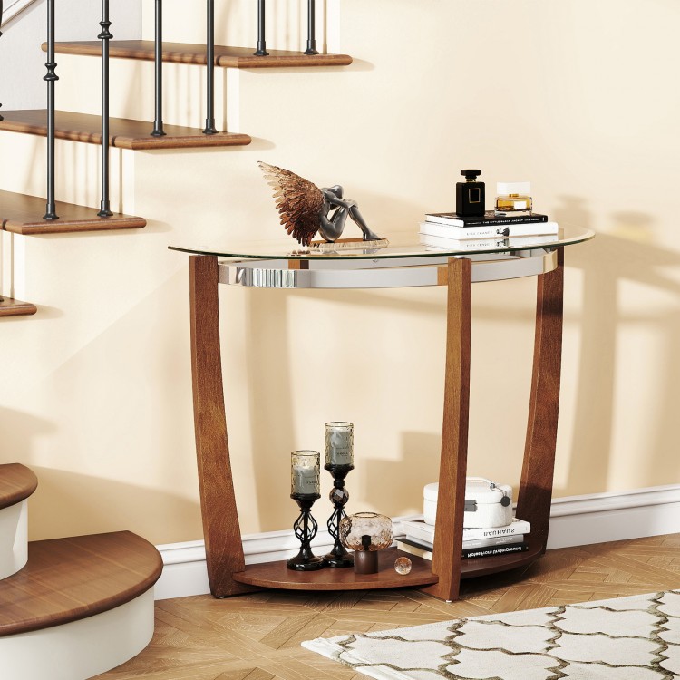 Half-moon tempered glass console table with walnut legs and open shelf, perfect for decorative storage and style.