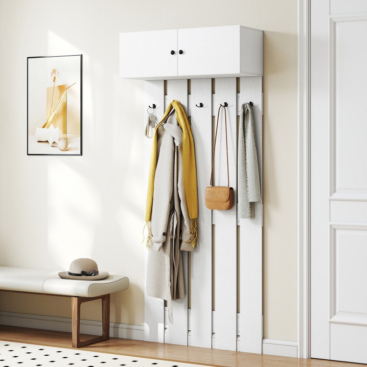 Wall-mounted coat rack in white with upper storage cabinet and five hooks, perfect for entryways and maximizing space.