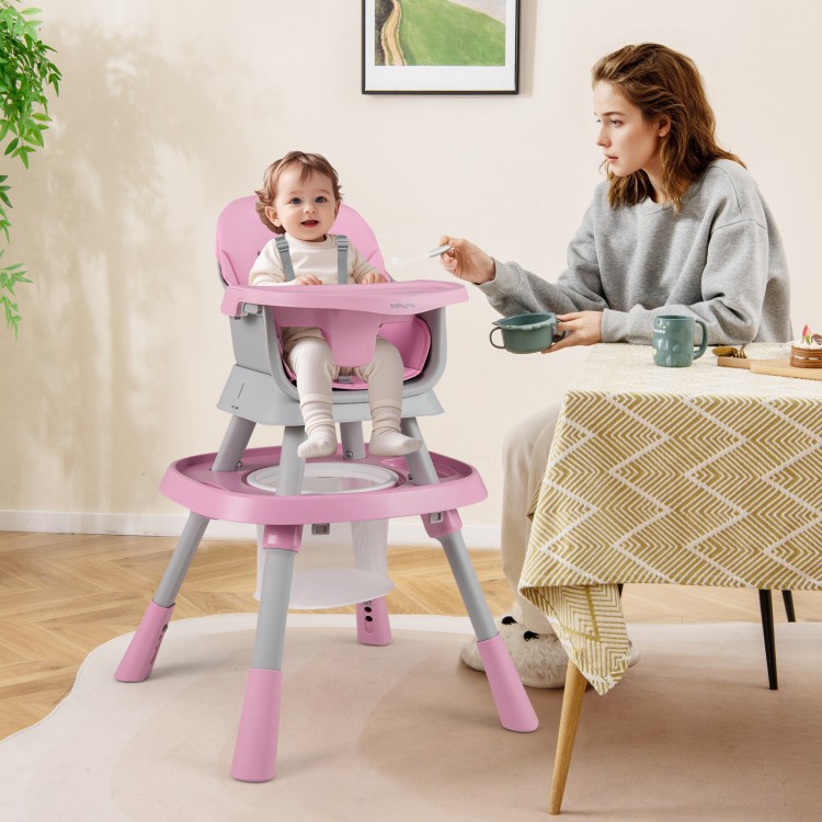 Baby high chair in pink with adjustable height, activity center, and 5-point harness for safe feeding and playtime.