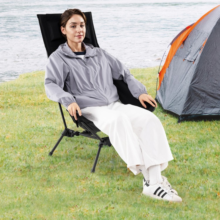 High back portable camping chair in black, featuring a built-in pillow and compact carry bag, perfect for outdoor.