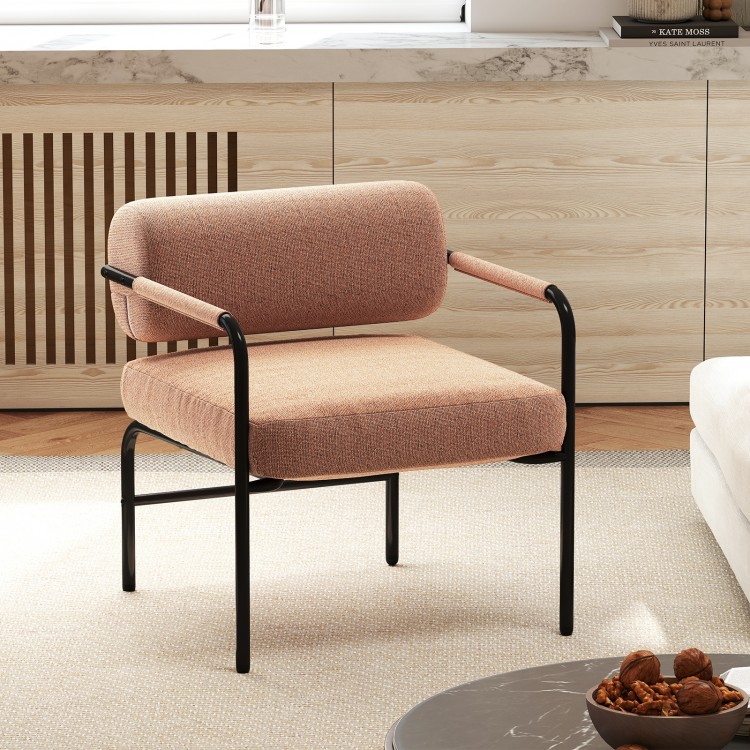 Velvet upholstered accent chair with cylindrical backrest and metal armrests, ideal for living room or home office use.