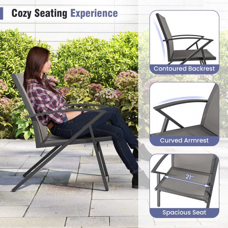 Spacious grey patio chair with contoured backrest and curved armrests, perfect for outdoor relaxation on your porch or.