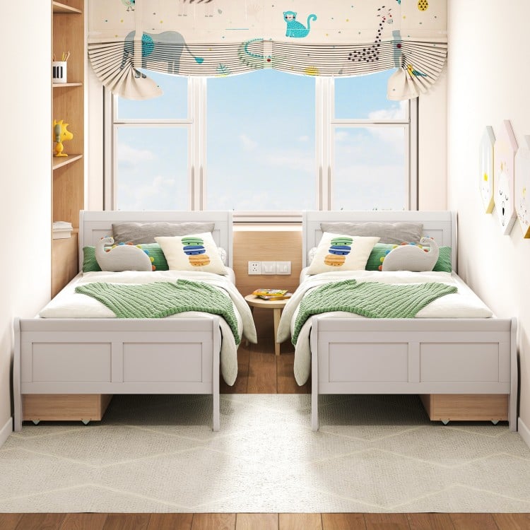 Twin size sleigh bed frame in white with two storage drawers, perfect for organizing bedroom essentials.