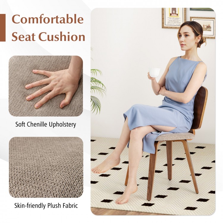 Comfortable padded seat of a walnut wooden dining chair, featuring soft chenille upholstery for cozy support.