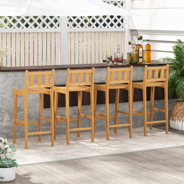 Teak wood bar chairs with backrest and footrest, ideal for deck or poolside, featuring a slatted design for comfort.
