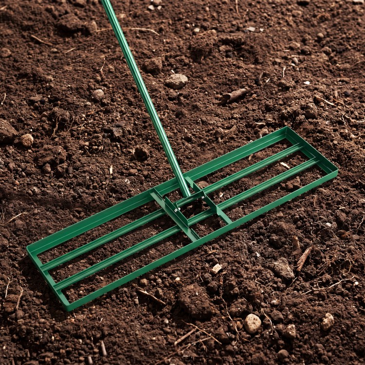 Lawn leveling rake with a 36 x 10 inch plate and ergonomic handle, ideal for leveling surfaces in gardens and backyards.