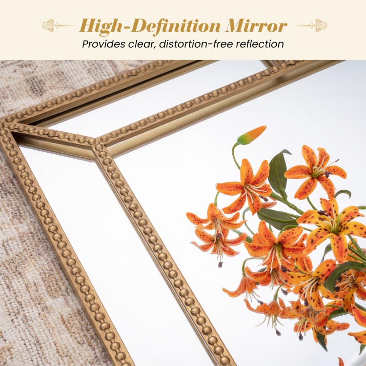 Gold wall mirror with beaded frame, 36 x 24 inches, providing high-definition reflection for elegant living room decor.