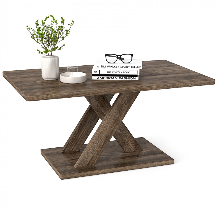 Rectangular coffee table with a geometric design, brown rubber wood finish, and spacious tabletop for living room use.
