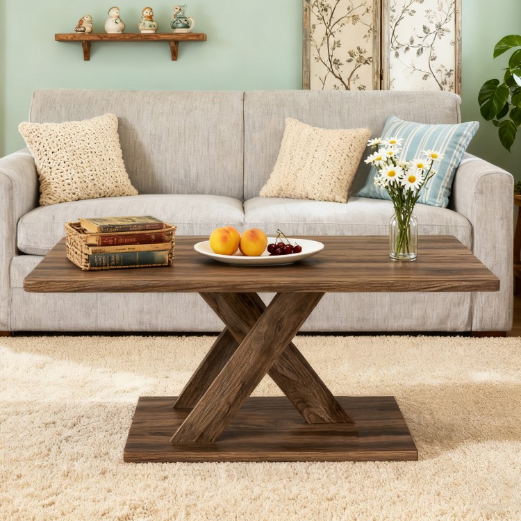 Rectangular coffee table with a rustic wood texture and sturdy rubber wood base, perfect for living room use.