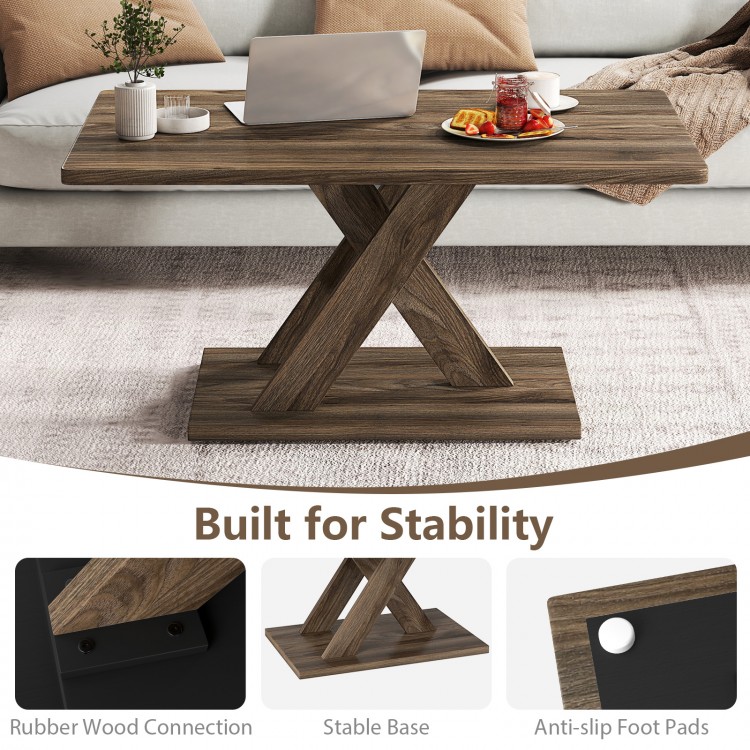 Rectangular coffee table with rubber wood connection, stable base, and rustic brown finish, perfect for living room use.