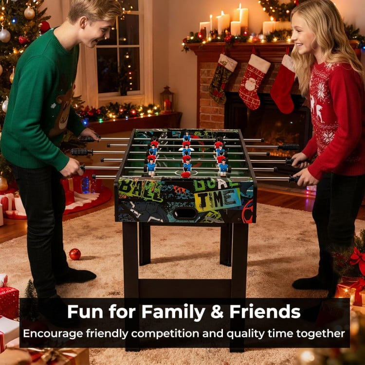 Mini foosball table with vibrant graphics, detachable legs, and sturdy MDF construction for tabletop or standalone play.