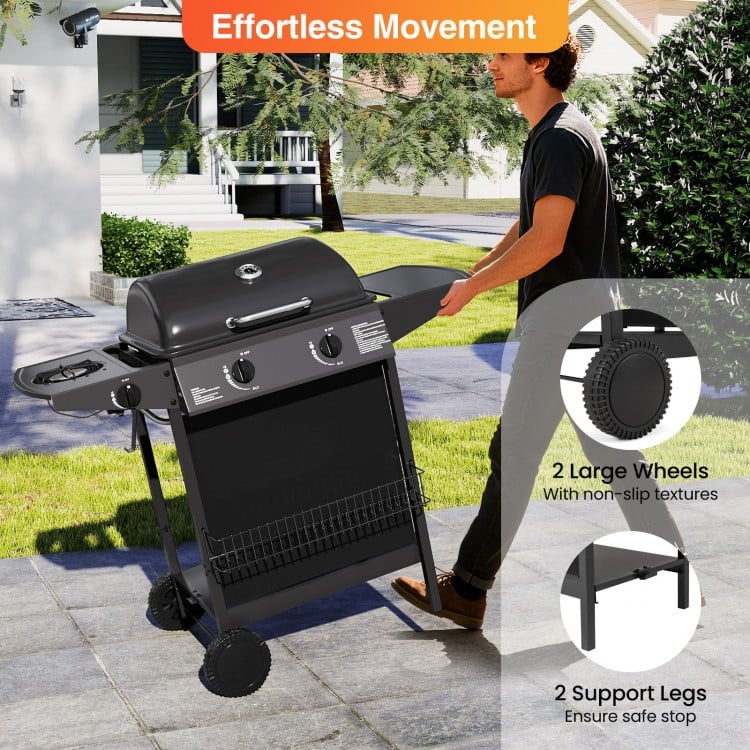 Outdoor propane gas grill on wheels with 39,000 BTU, large wheels for mobility, and sturdy support legs for stability.