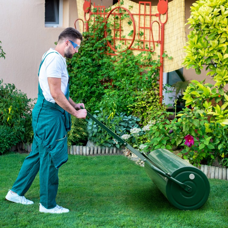 39-inch green lawn roller made of powder-coated metal, designed for push, pull, or tow use in gardens and yards.