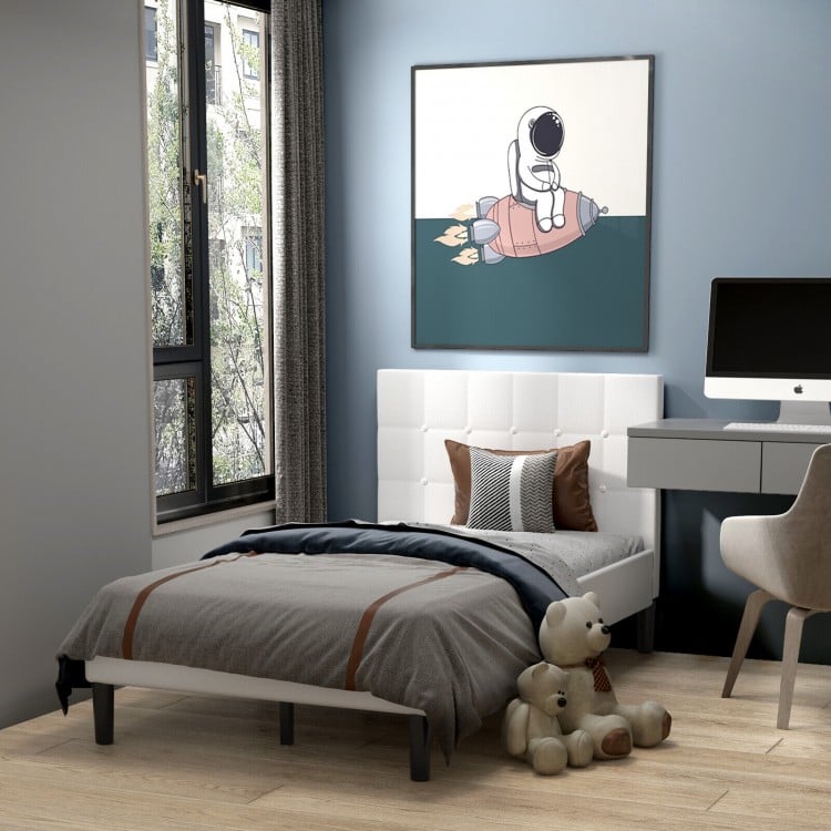 Twin platform bed with button tufted beige headboard, featuring sturdy construction and 7-inch under-bed storage space.