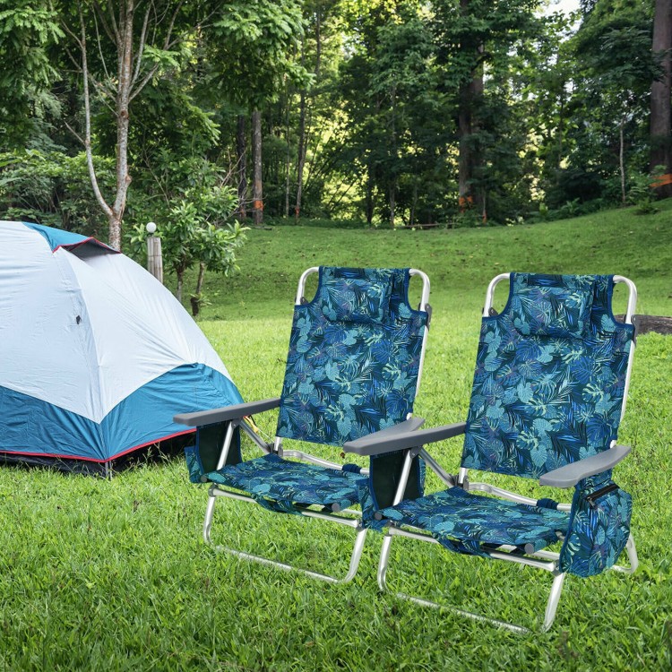 Two navy outdoor folding beach chairs with 5-position adjustable backrests, set up beside a tent in a grassy area.