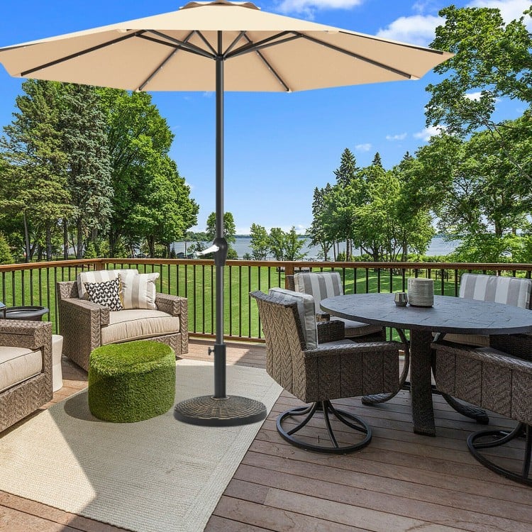 Patio market umbrella base stand with rattan design, 27 lbs, ideal for outdoor use on balconies or by the poolside.