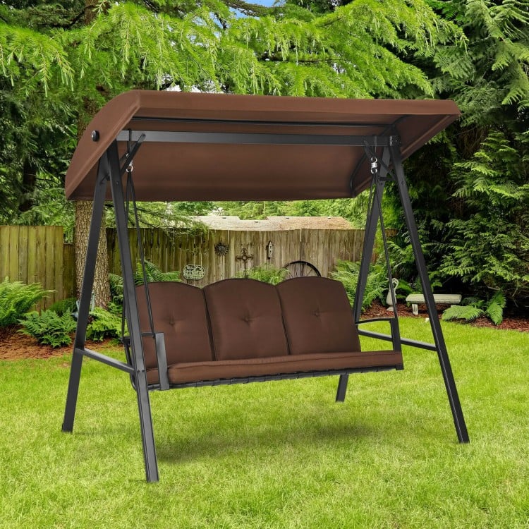 Outdoor 3-seat porch swing with adjustable canopy and brown cushions, perfect for backyard relaxation and comfort.