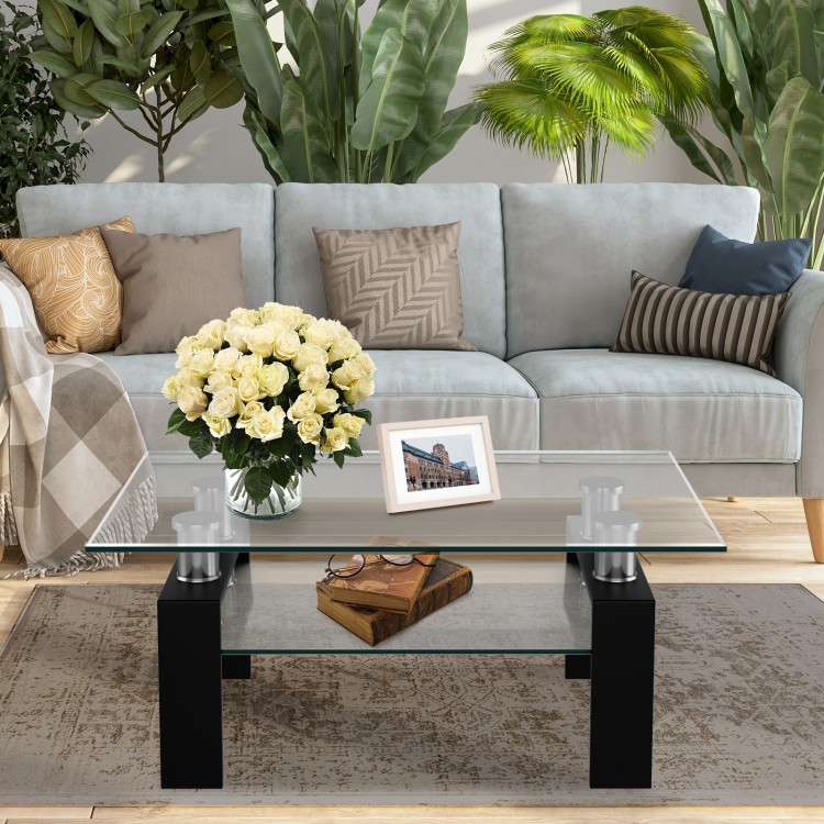 Rectangle glass coffee table with black metal legs, featuring a double-tier design for living room storage.