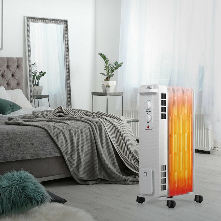Portable 1500 W oil-filled radiator heater in white, featuring adjustable thermostat and three heat settings for quiet.