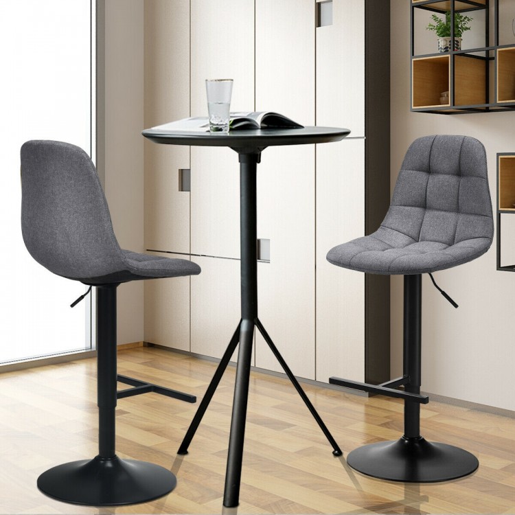 Adjustable gray linen bar stools with T-shaped footrest and swivel design, perfect for kitchens and cafes.
