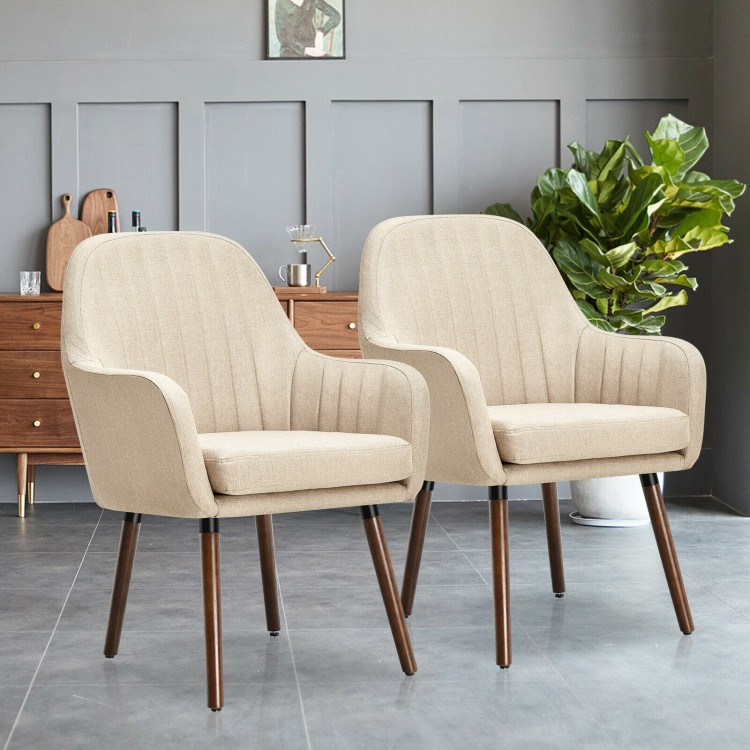 Set of 2 beige fabric upholstered accent chairs with wooden legs, featuring ergonomic armrests for comfort in any room.
