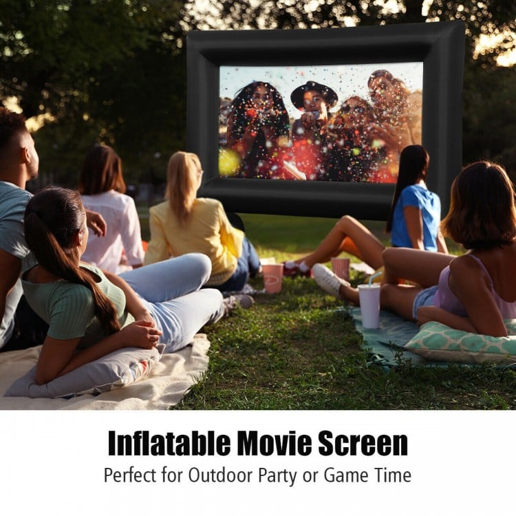 Inflatable outdoor movie screen setup with viewers enjoying a film, perfect for parties and gatherings.