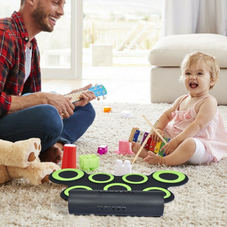 Electronic roll-up drum set with 7 pads in green, perfect for beginners and children, featuring dual speakers and MIDI.