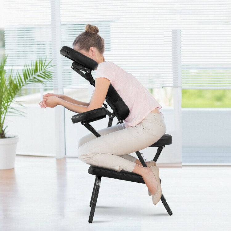 Foldable PU leather travel massage chair with adjustable face cradle and armrest, ideal for relaxation and comfort.