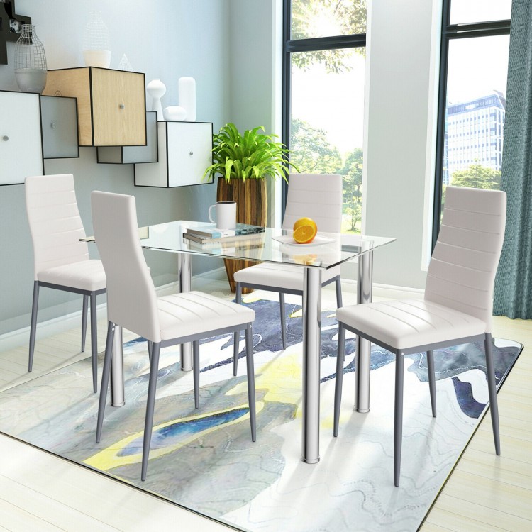 5-piece dining set featuring a clear glass table and four white PVC leather chairs, perfect for modern dining spaces.