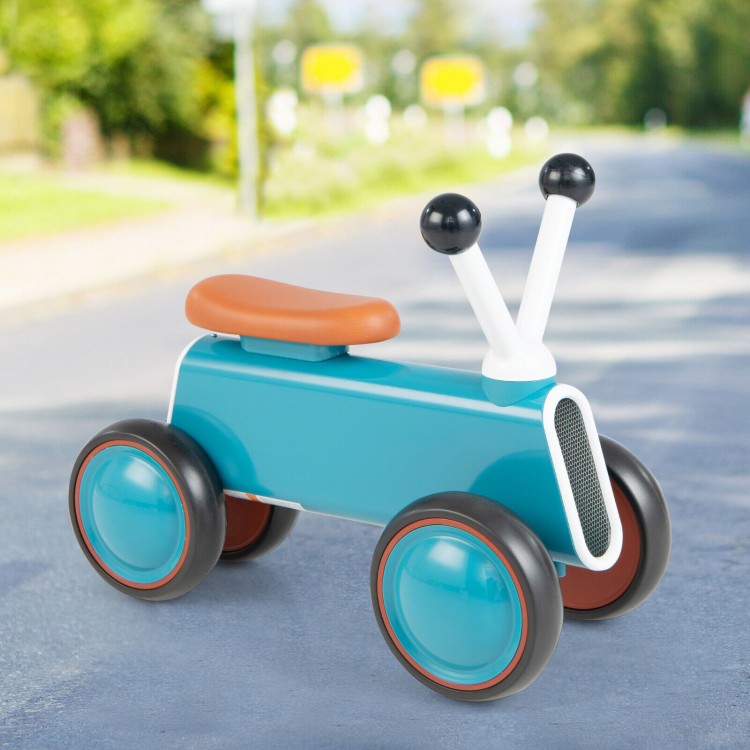 Baby balance bike in blue with non-slip handlebars and 4 stable wheels, designed for kids 10-24 months to promote.