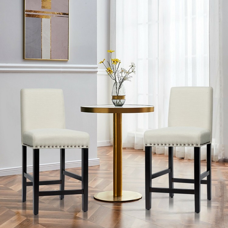 Beige kitchen chairs with rubber wood legs and soft cushions, perfect for dining rooms or bars.