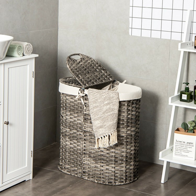 Handwoven gray laundry hamper basket with removable liner bags, perfect for organizing dirty clothes in any room.