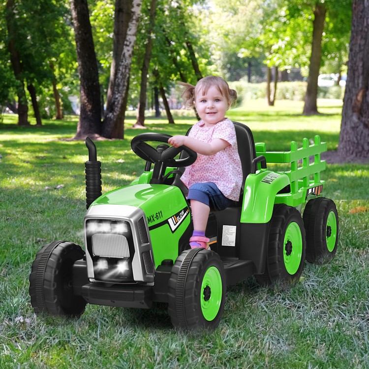Child riding a green 12V ride-on tractor with detachable trailer, designed for fun and safe outdoor play.