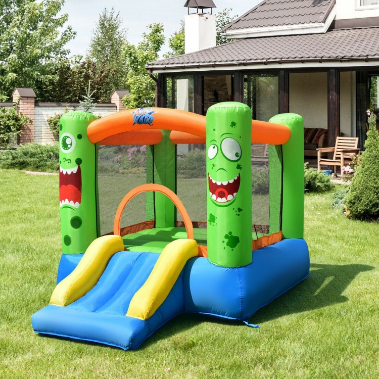 Inflatable castle bounce house with slide, bright colors, large jumping area, perfect for kids' outdoor play.