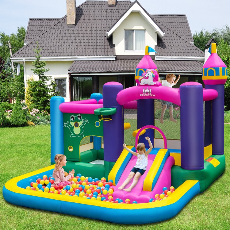 Unicorn-themed 6-in-1 inflatable bounce house with slide and ball pit, perfect for kids' outdoor playtime.