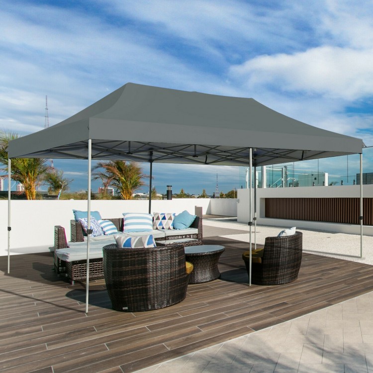 Adjustable 10x20 feet gray folding sun shelter with sturdy steel frame, ideal for outdoor parties and picnics.