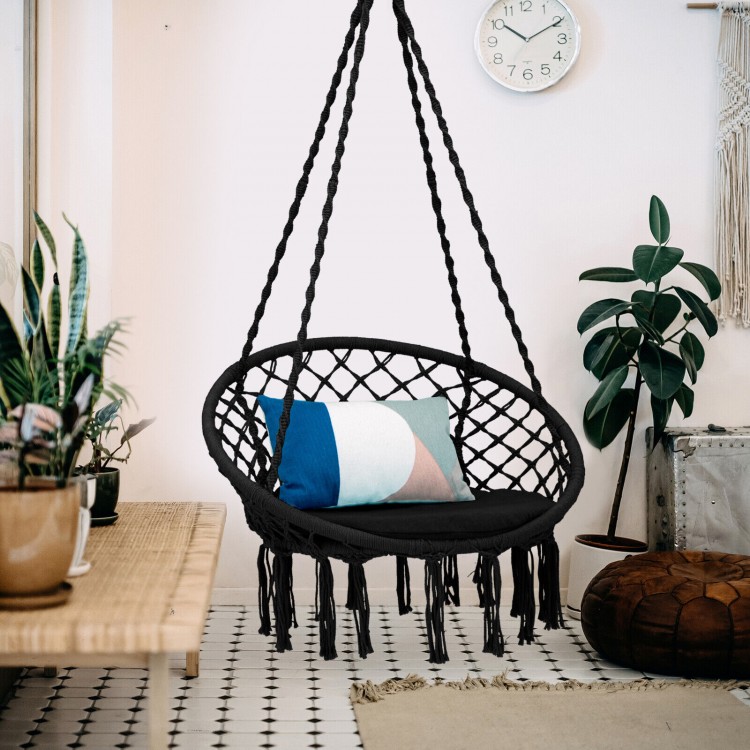 Cushioned black hammock swing chair with tassels, designed for comfort and stability, perfect for indoor or outdoor.