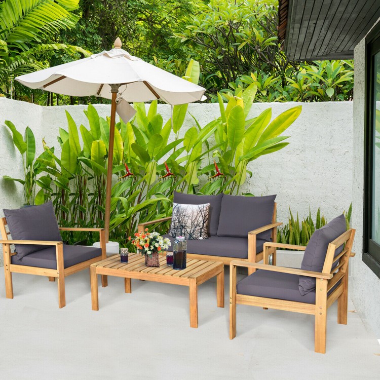 4-piece outdoor acacia wood chat set with a central coffee table, perfect for garden gatherings and family time.