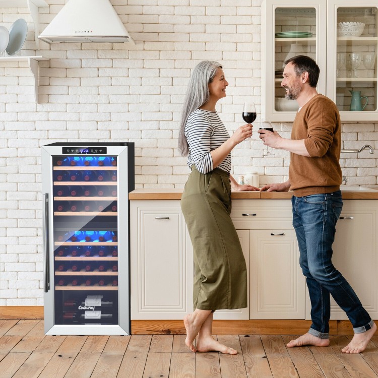 Wine cooler refrigerator with dual zone temperature control, 43 bottle capacity, and stainless steel door in a kitchen.
