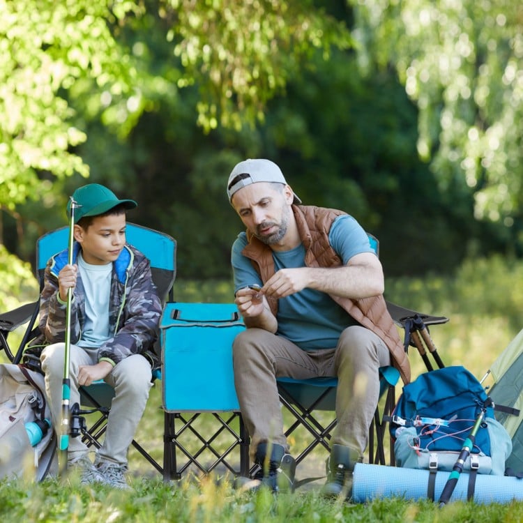 Portable folding camping chairs in blue with cup holders and detachable canopy, perfect for outdoor relaxation.