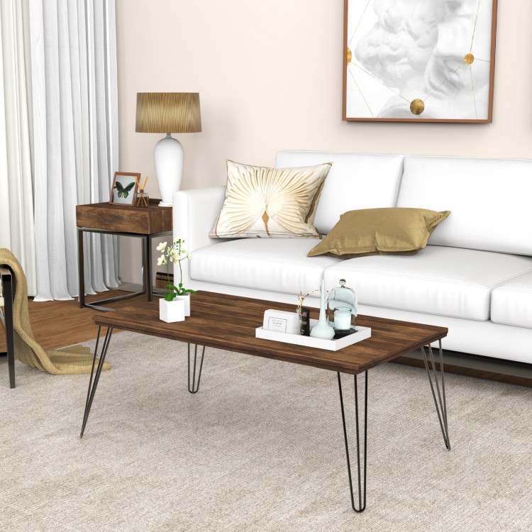 Wooden rectangular coffee table with metal legs, 43.5" x 23.5", perfect for drinks and snacks in a stylish living room.