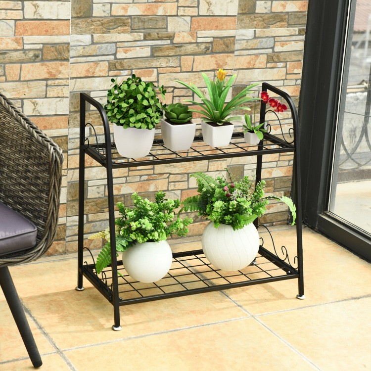 2-tier patio metal plant stand with black finish, showcasing potted plants, ideal for indoor or outdoor use.