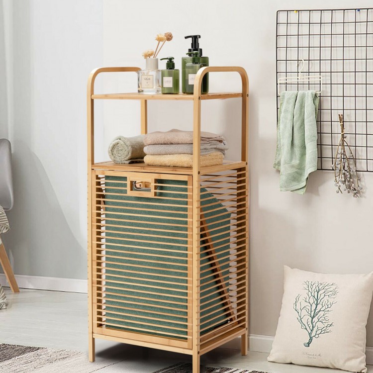 Tilt-out bamboo laundry hamper with removable liner and 2-tier shelf for bathroom or bedroom storage.