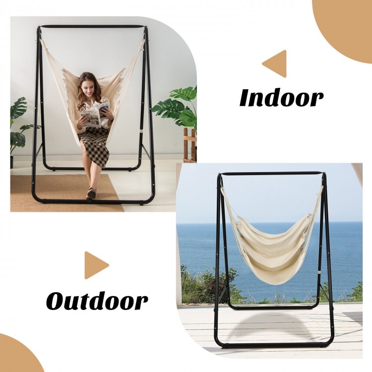 Hanging padded hammock chair with stand in beige, showcasing indoor and outdoor use for comfortable swinging.