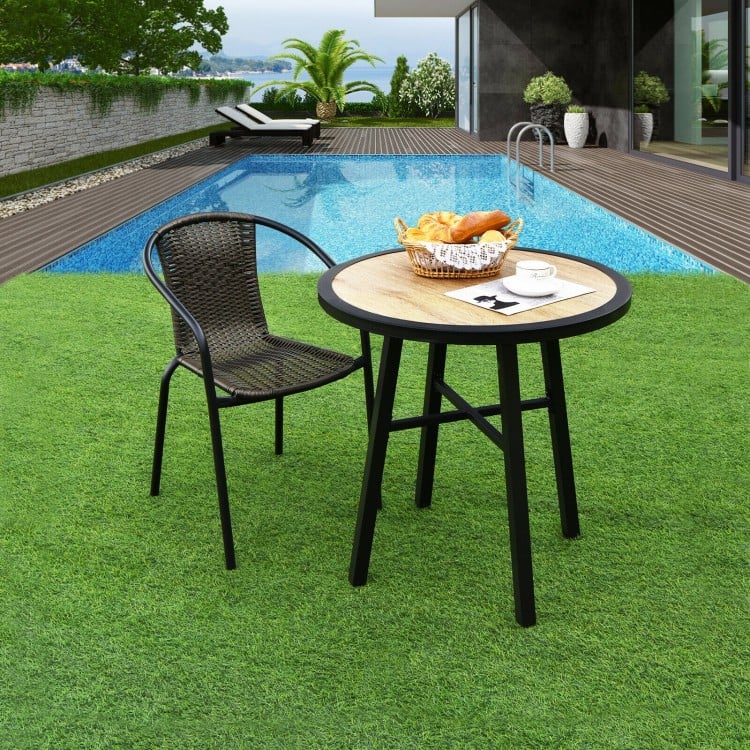 29-inch round patio bistro table with wood-like top and sturdy steel frame, ideal for outdoor dining by the pool.